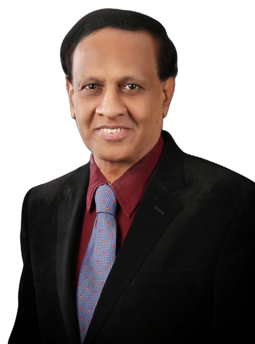 Studio portrait of Dr. D. A. Satish in a dark blazer and tie.